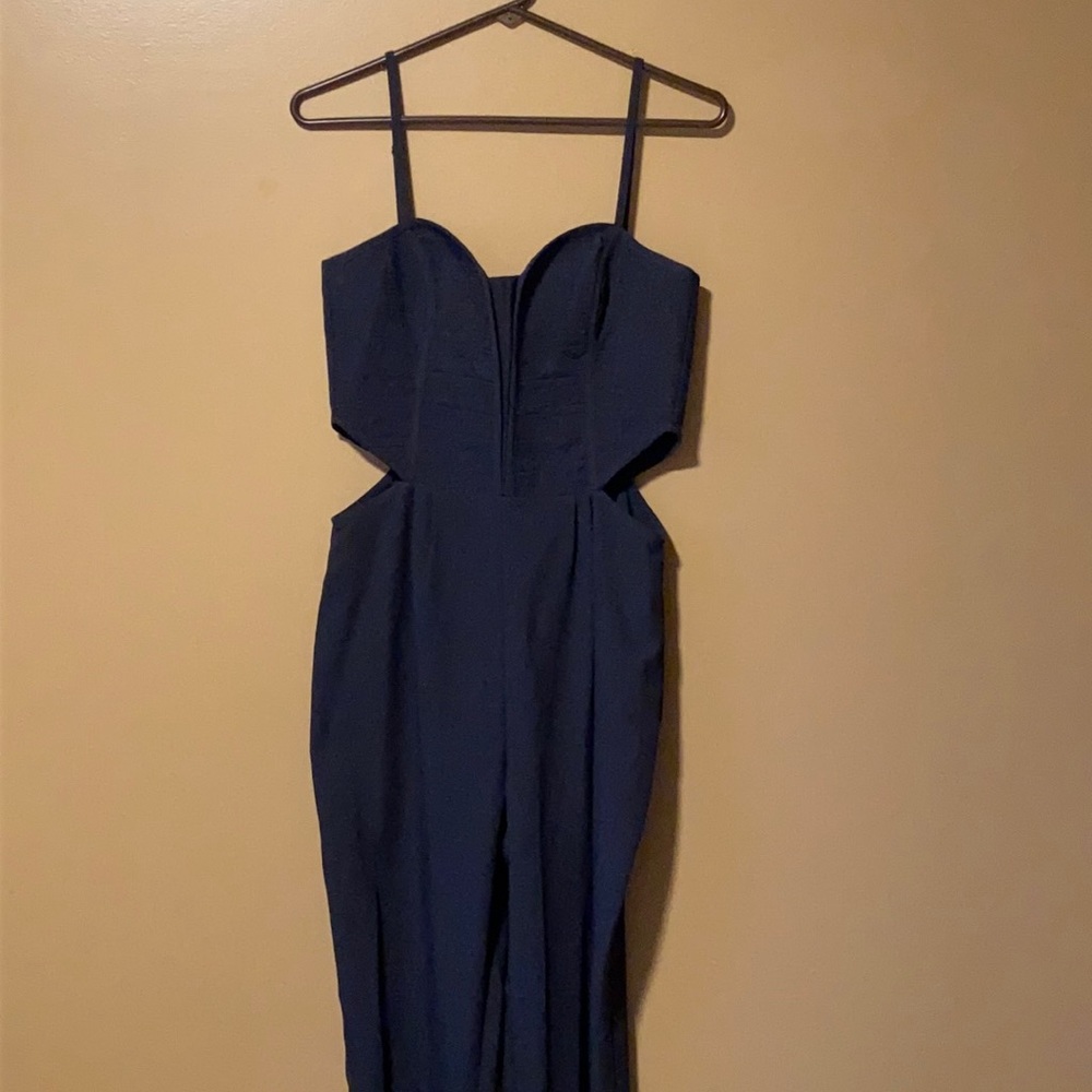 Divided Dark Blue-form fitting jumpsuit-size 6